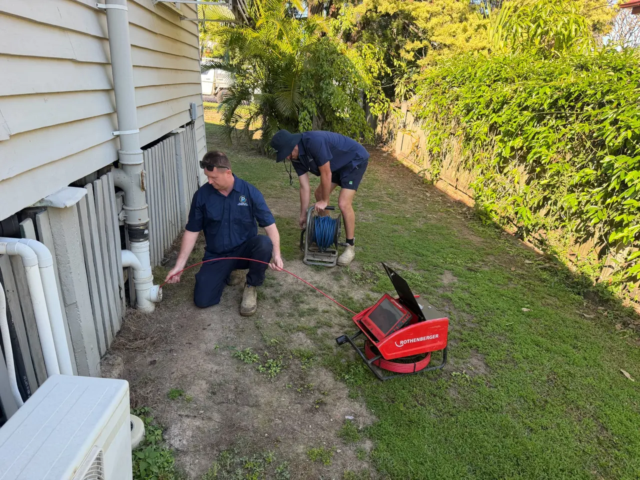 Brisbane commercial plumbers performing a CCTV drain inspection